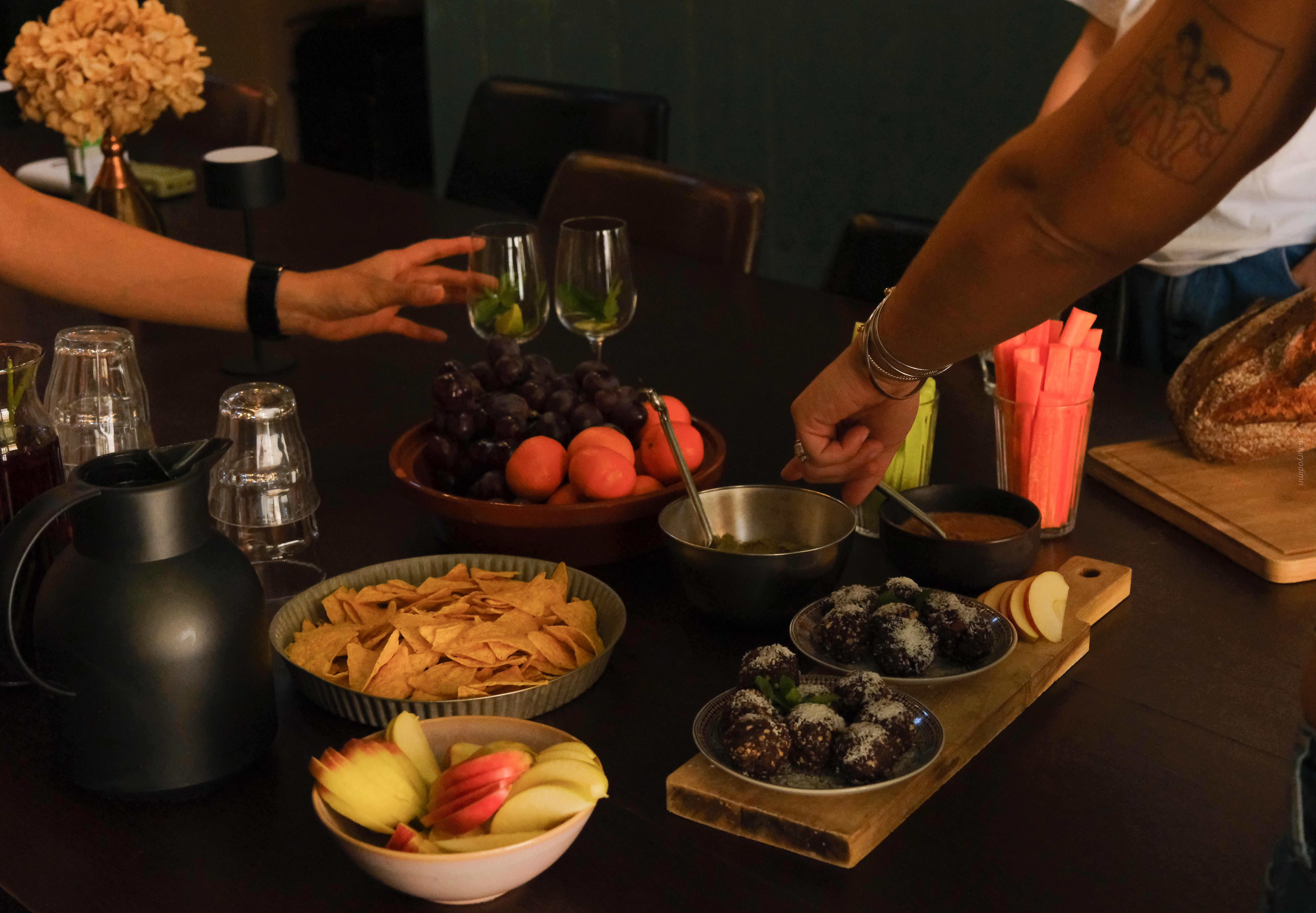 Snacks and drinks spread at the retreat table